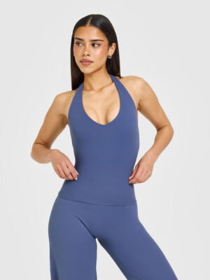 SOFTMOTION HALTER NECK VEST WITH BUILT IN BRA SHELF WITH WHITE LOGO
