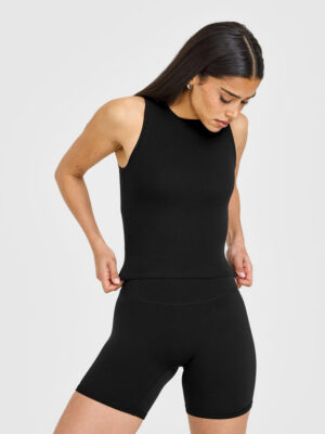 SOFTMOTION HIGH NECK MID VEST WITH WHITE LOGO