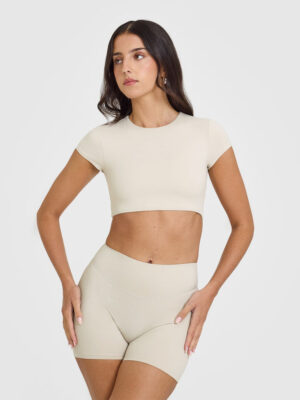 SOFTMOTION SHORT SLEEVE CROP TOP WITH WHITE LOGO