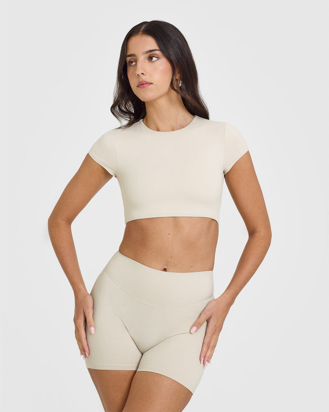 240930_SOFTMOTION_SHORT_SLEEVE_CROP_TOP_SAND_PDP_1440x1800_01_650x.jpg