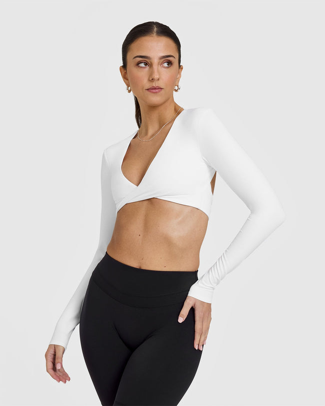 250107_VDAY_UNIFIED_TWIST_FRONT_LONG_SLEEVE_CROP_TOP_WHITE_PDP_1440x1800_01_650x.jpg