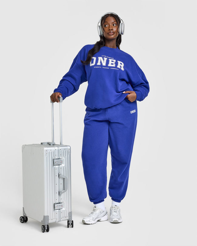 250225_STRONG_IS_A_STATEMENT_MID-WEIGHT_SWEATSHIRT_PRINTED_LOGO_SPACEBLUE_PDP_1440x1800_03_650x.jpg