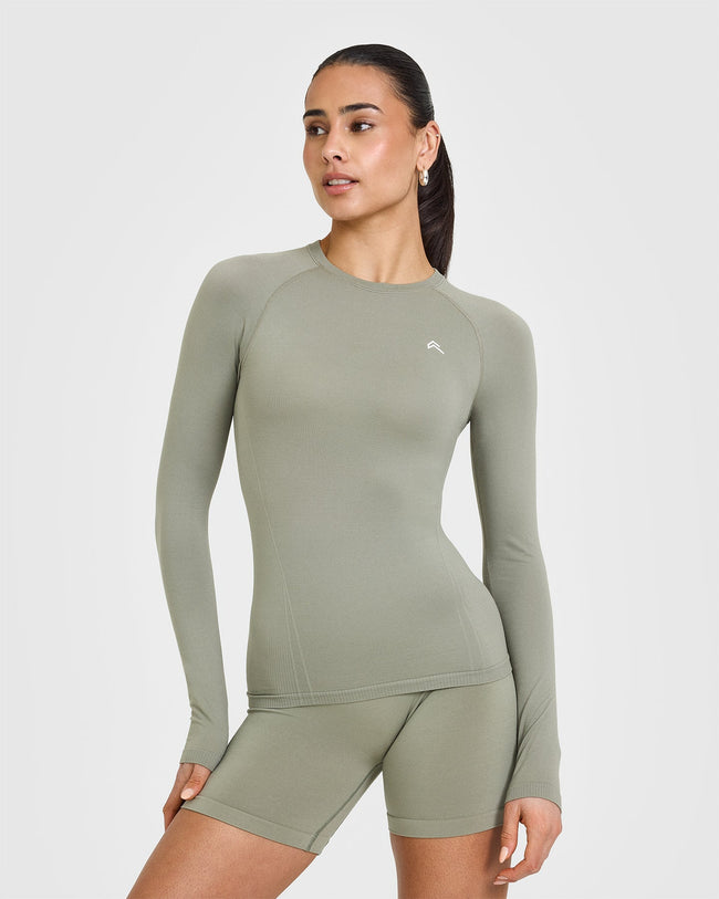 250227_STRONG_IS_A_STATEMENT_GO_TO_SEAMLESS_FITTED_LONG_SLEEVE_TOP_SOFTSAGEGREEN_PDP_1440x1800_01_650x.jpg