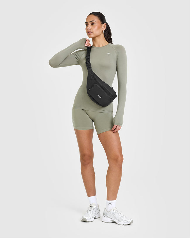 250227_STRONG_IS_A_STATEMENT_GO_TO_SEAMLESS_FITTED_LONG_SLEEVE_TOP_SOFTSAGEGREEN_PDP_1440x1800_03_650x.jpg