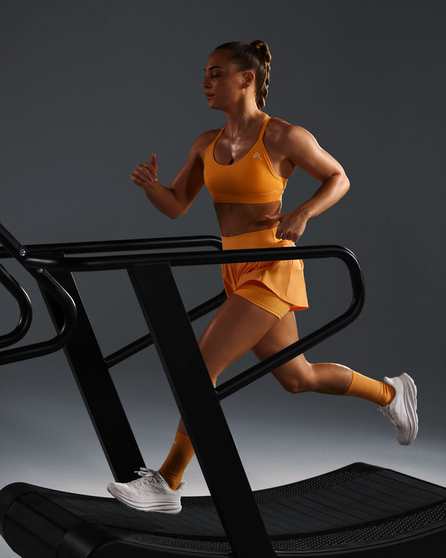 250320_HYBRID_EVERYDAY_SPORTS_BRA_POWDEREDORANGE_PDP_1440x1800_02_e4d73735-a84e-4c95-a9c7-076f1d2d8187_650x.jpg