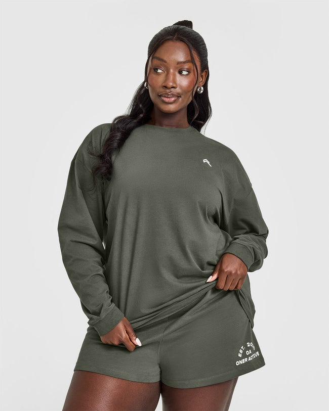 250404_BEYONDMOVEMENT_CLASSIC_OVERSIZED_LIGHTWEIGHT_LONG_SLEEVE_TOP_DARKKHAKI_PDP_1440x1800_01_650x.jpg