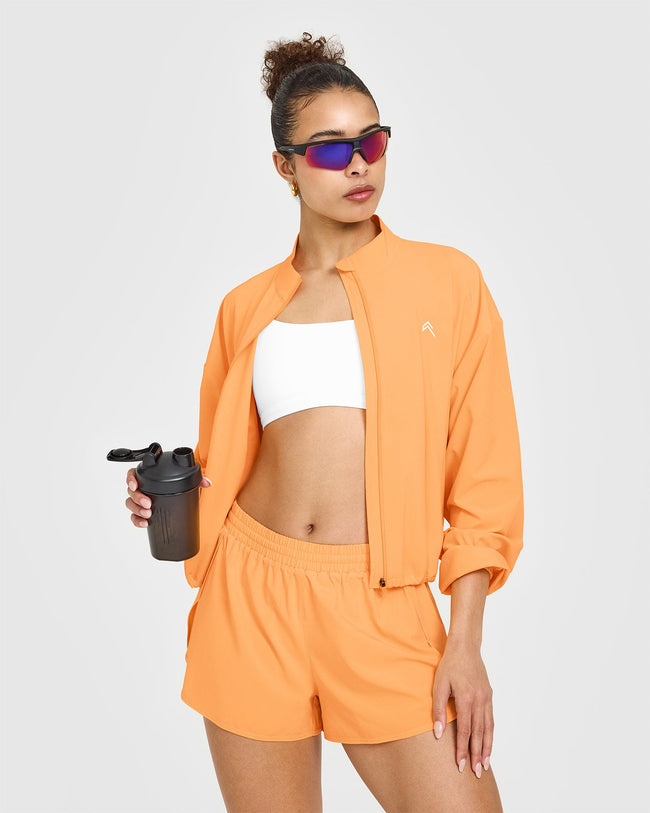 250409_HYBRID_AIRMOVE_JACKET_POWDEREDORANGE_PDP_1440x1800_06_650x.jpg