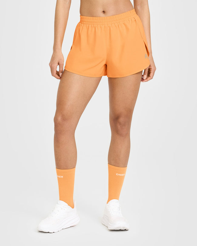 250409_HYBRID_AIRMOVE_SHORTS_POWDEREDORANGE_PDP_1440x1800_01_20bffea8-fc20-4b3e-9fb5-4b37ec981cfb_650x.jpg