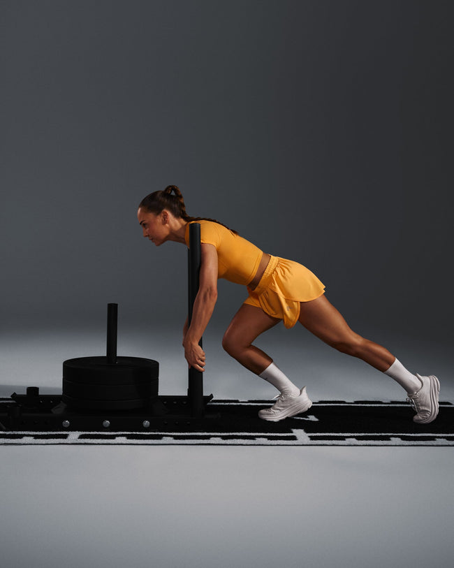 250409_HYBRID_AIRMOVE_SHORTS_POWDEREDORANGE_PDP_1440x1800_03_20fc17a5-be90-4dc9-8351-2fffbea6dd8b_650x.jpg