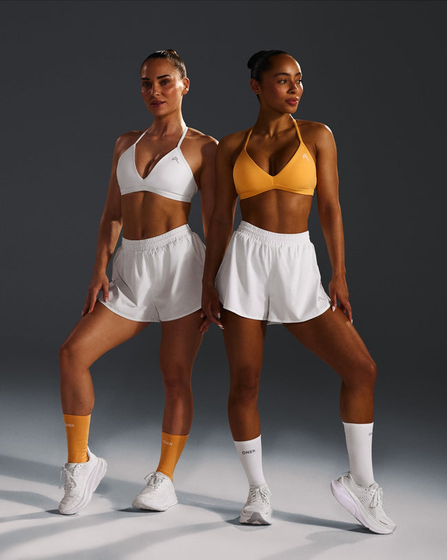 250409_HYBRID_AIRMOVE_SHORTS_WHITE_PDP_1440x1800_04_948022a6-ccc7-476f-815f-a451811ce720_650x.jpg