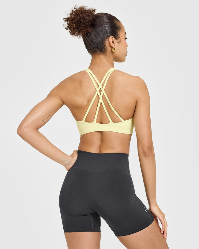 250409_HYBRID_EASYLIFT_HIGH_NECK_SPORTS_BRA_PASTELYELLOW_PDP_1440x1800_02_650x.jpg