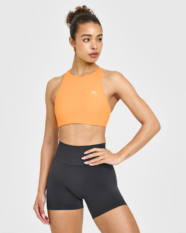250409_HYBRID_EASYLIFT_HIGH_NECK_SPORTS_BRA_POWDEREDORANGE_PDP_1440x1800_01_650x.jpg