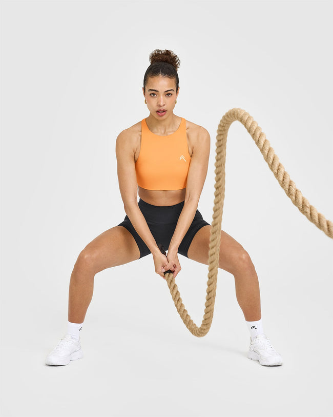 250409_HYBRID_EASYLIFT_HIGH_NECK_SPORTS_BRA_POWDEREDORANGE_PDP_1440x1800_06_650x.jpg