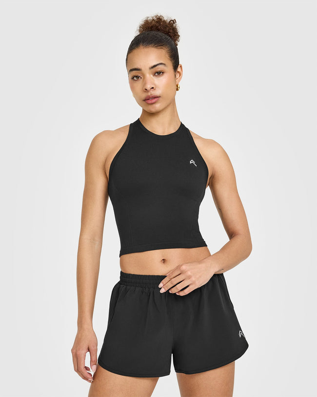 250409_HYBRID_GO_TO_SEAMLESS_FITTED_HIGH_NECK_MID_VEST_BLACK_PDP_1440x1800_01_650x.jpg