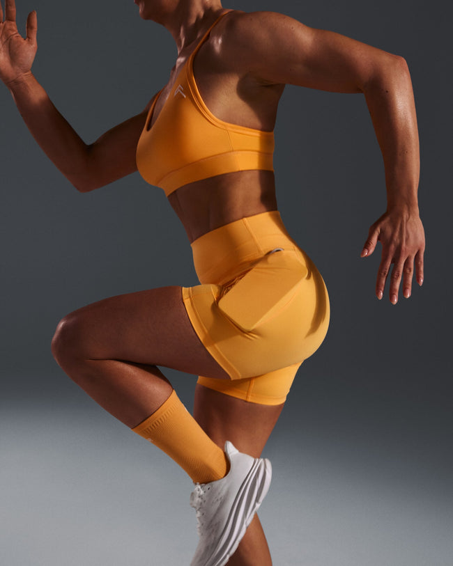 250410_HYBRID_UNIFIED_POCKET_SHORTS_POWDEREDORANGE_PDP_1440x1800_06_650x.jpg
