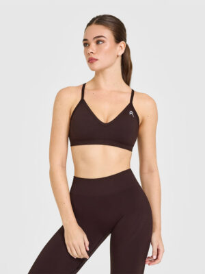 ENHANCELIFT SEAMLESS STRAPPY SPORTS BRA WITH WHITE LOGO