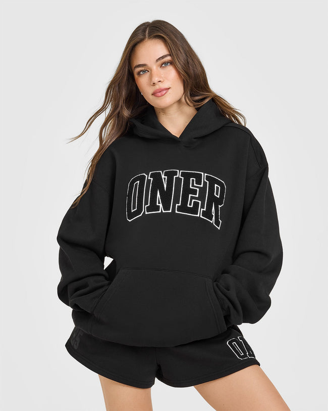 ACCENTUATE_FOUNDATIONS_OVERSIZED_ONER_25_HOODIE_BLACK_250718_PDP_1440x1800_01_650x.jpg