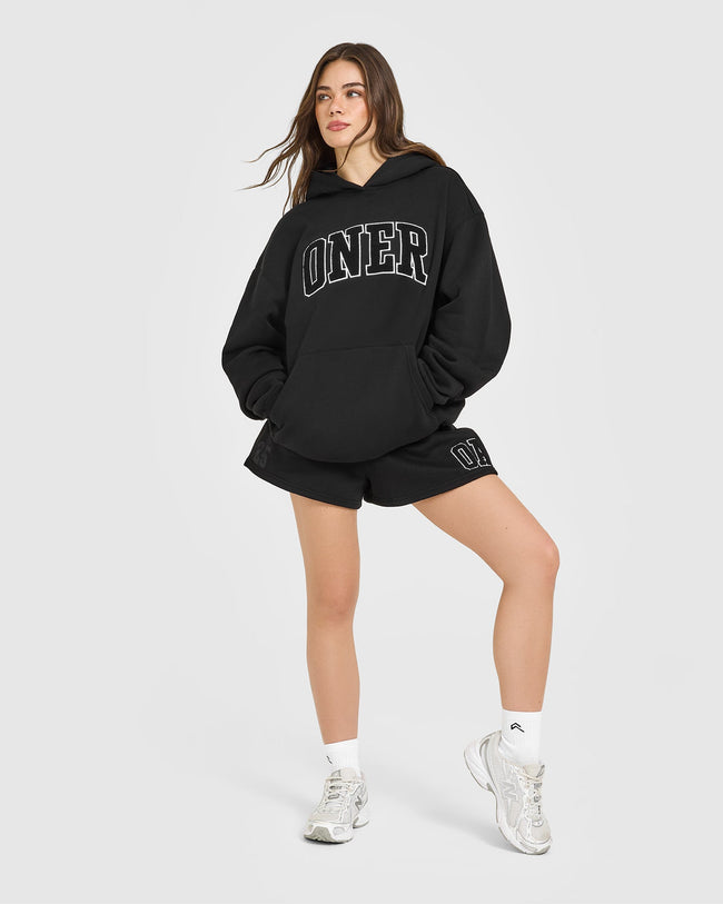 ACCENTUATE_FOUNDATIONS_OVERSIZED_ONER_25_HOODIE_BLACK_PAUSE_RECHARGE_SOFTMOTION_HIGH_WAISTED_CAPRI_PANTS_BLACK_250718_PDP_1440x1800_03_650x.jpg