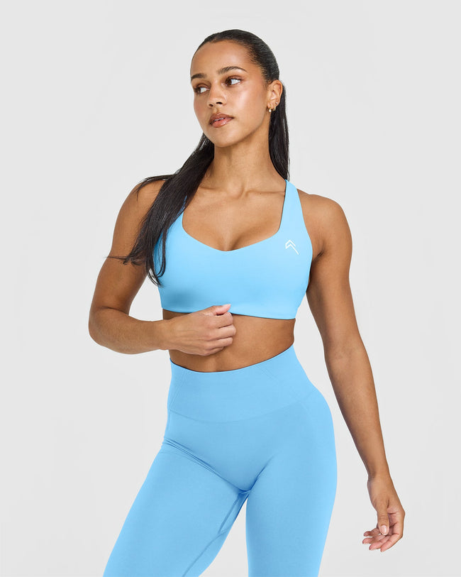 AT_YOUR_PACE_EASYLIFT_CROSS_BACK_SPORTS_BRA_ARCTICBLUE_250618_PDP_1440x1800_01_882f0901-3d24-4b58-aadb-e889e44d320a_650x.jpg