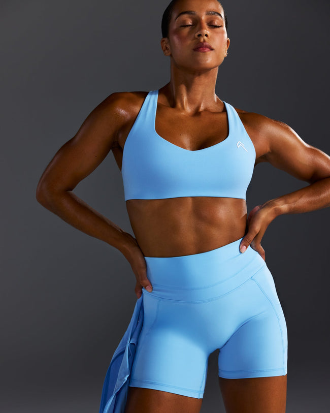 AT_YOUR_PACE_EASYLIFT_CROSS_BACK_SPORTS_BRA_ARCTICBLUE_250618_PDP_1440x1800_02_43a3be7a-b29c-43dd-8266-b0f127de8e00_650x.jpg