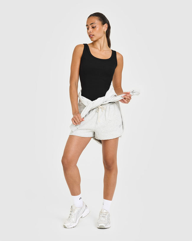 AT_YOUR_PACE_MELLOW_RIB_SCOOP_NECK_VEST_BLACK_250627_PDP_1440x1800_03_650x.jpg