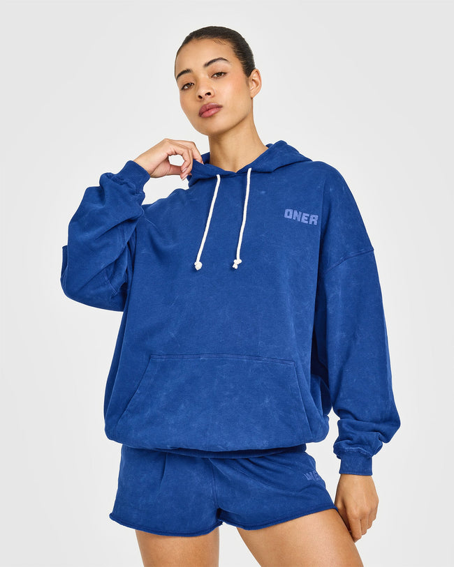 AT_YOUR_PACE_RAW_LOUNGE_OVERSIZED_HOODIE_VINTAGENAVY_250624_PDP_1440x1800_01_650x.jpg