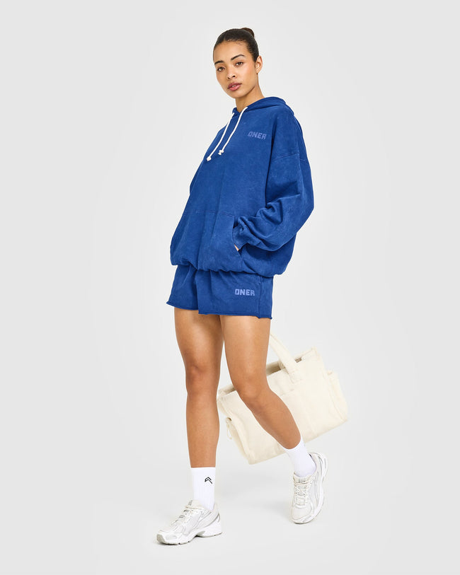 AT_YOUR_PACE_RAW_LOUNGE_OVERSIZED_HOODIE_VINTAGENAVY_250624_PDP_1440x1800_03_650x.jpg