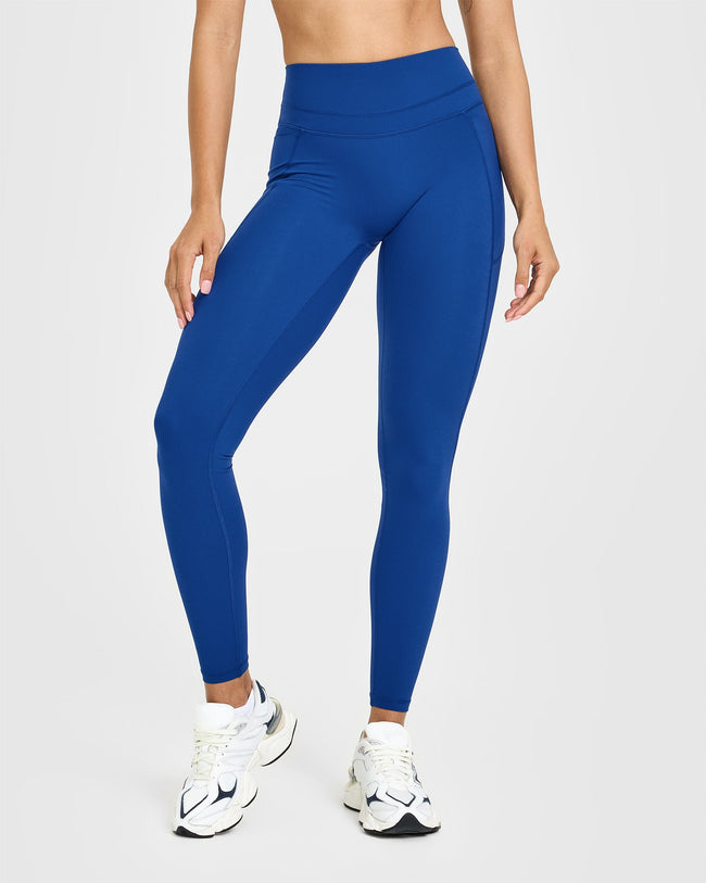 AT_YOUR_PACE_UNIFIED_HIGH_WAISTED_POCKET_LEGGINGS_VINTAGENAVY_250611_PDP_1440x1800_01_650x.jpg