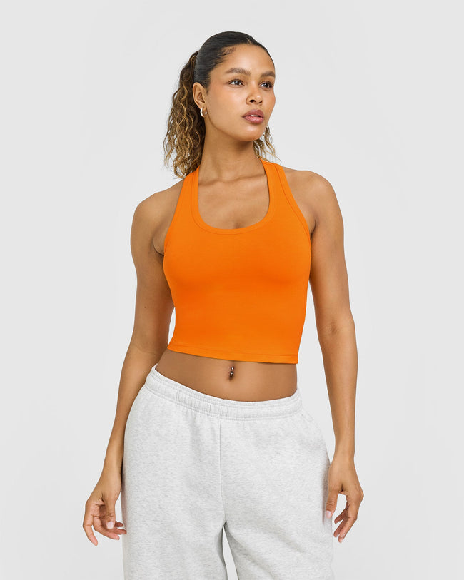 BAU_BRIGHTS_COTTON_FITTED_MID_VEST_FLAMEORANGE_250813_PDP_1440x1800_01_4d828e32-bea1-4db4-adfc-94b3d485c449_650x.jpg