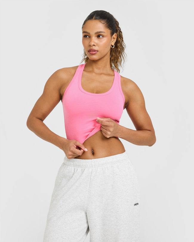 BAU_BRIGHTS_COTTON_FITTED_MID_VEST_PEONYPINK_250813_PDP_1440x1800_01_f27fff6a-df22-46ae-8eeb-09f56526f1b8_650x.jpg