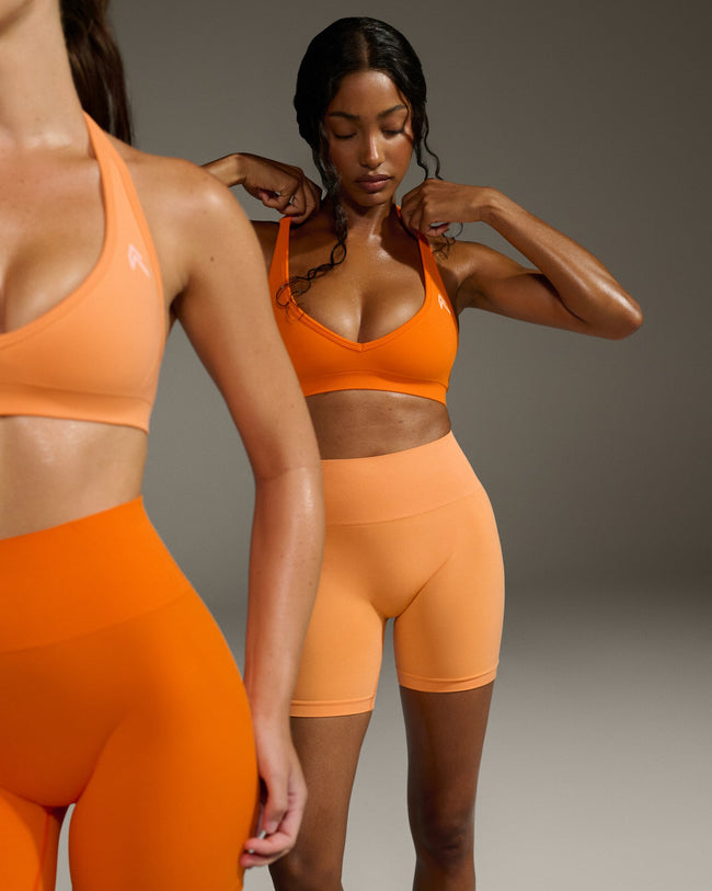 BAU_BRIGHTS_EFFORTLESS_HALTER_NECK_SPORTS_BRA_FLAMEORANGE_250813_PDP_1440x1800_02_4308a569-07ad-4d8a-8320-6038f2a38bd3_650x.jpg