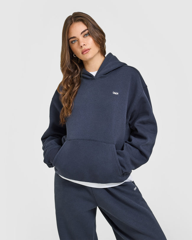 BAU_FOUNDATIONS_HOODIE_TRUEBLUE_250827_PDP_1440x1800_01_650x.jpg