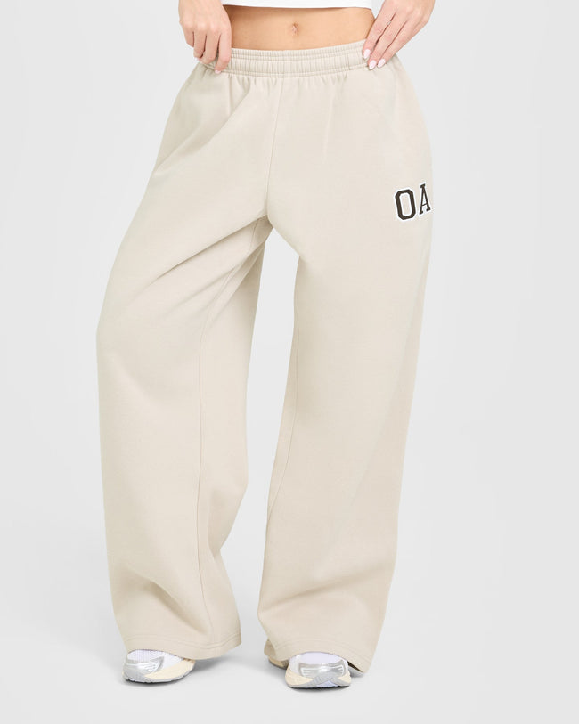 BAU_GRAPHIC_INJECT_FOUNDATIONS_OVERSIZED_GIRLFRIEND_STRAIGHT_LEG_JOGGERS_SAND_250930_PDP_1440x1800_01_5fe6945a-0ac4-429b-ba36-8705b9f1ce02_650x.jpg