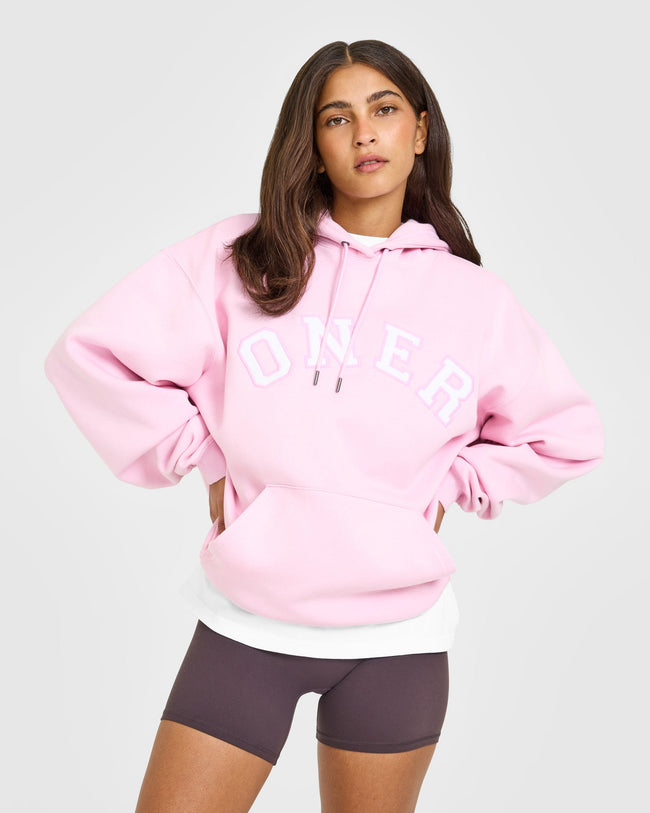 BAU_GRAPHIC_INJECT_FOUNDATIONS_OVERSIZED_ONER_GIRLFRIEND_HOODIE_CHALKPINK_250922_PDP_1440x1800_01_650x.jpg