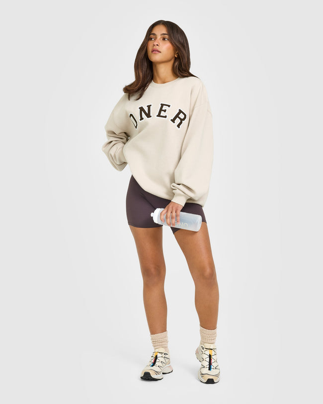 BAU_GRAPHIC_INJECT_FOUNDATIONS_OVERSIZED_ONER_GIRLFRIEND_SWEATSHIRT_SAND_250922_PDP_1440x1800_03_5e75fc74-2591-4109-ae8c-bf8e615428f1_650x.jpg