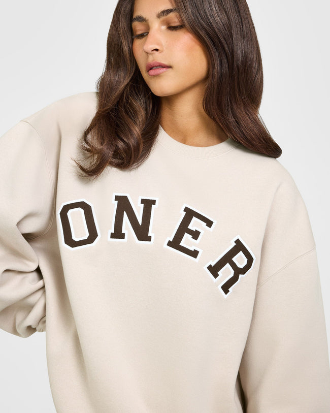 BAU_GRAPHIC_INJECT_FOUNDATIONS_OVERSIZED_ONER_GIRLFRIEND_SWEATSHIRT_SAND_250922_PDP_1440x1800_05_f9b0c866-7261-41e4-b6b9-862060ae2e88_650x.jpg
