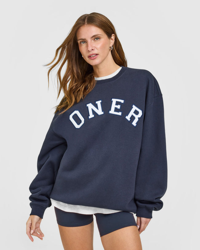 BAU_GRAPHIC_INJECT_FOUNDATIONS_OVERSIZED_ONER_GIRLFRIEND_SWEATSHIRT_TRUEBLUE_250915_PDP_1440x1800_01_650x.jpg