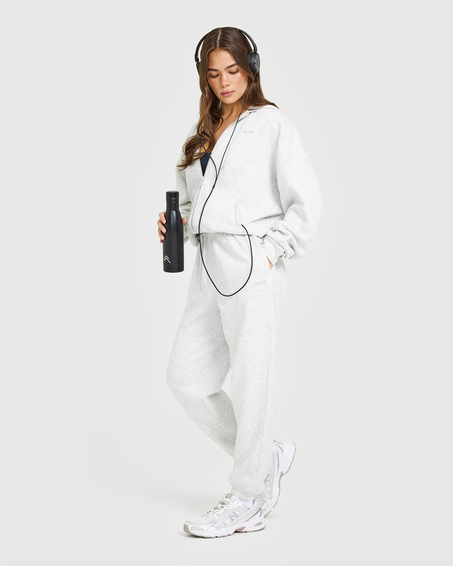 BAU_MID_WEIGHT_RELAXED_ZIP_THROUGH_HOODIE_LIGHTGREYMARL_250716_PDP_1440x1800_03_3d0614ea-be8e-4b2c-aac4-46783da2426a_650x.jpg