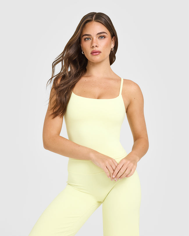 BAU_SOFTMOTION_STRAPPY_MID_VEST_BUILT_IN_BRA_SHELF_PASTELYELLOW_250805_PDP_1440x1800_01_650x.jpg