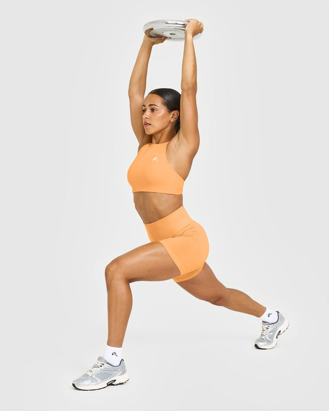 HYBRID_EFFORTLESS_SEAMLESS_SHORTS_POWDEREDORANGE_250623_PDP_1440x1800_03_650x.jpg
