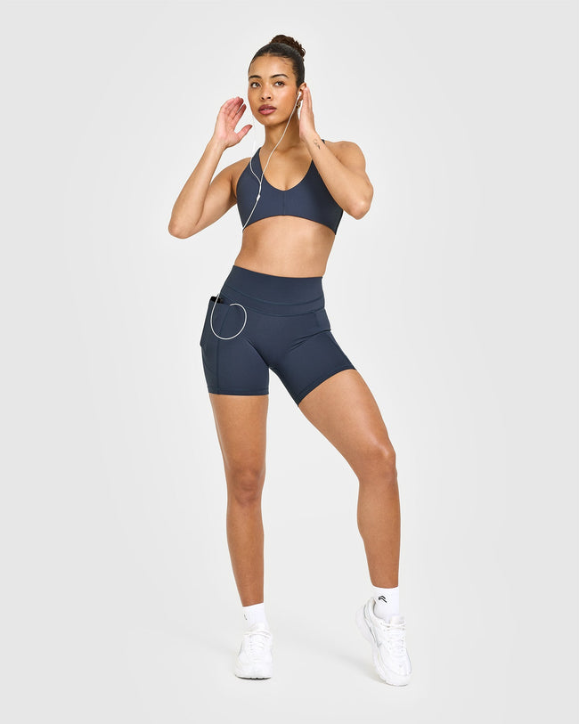 JULYBAU_UNIFIED_HIGH_WAISTED_POCKET_SHORTS_TRUEBLUE_250611_PDP_1440x1800_03_650x.jpg