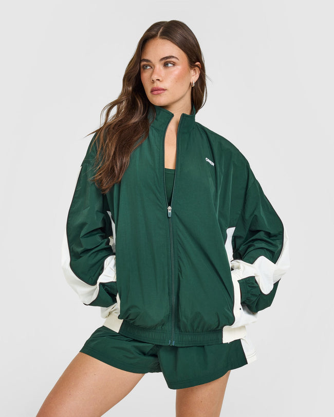 LIFESTYLE_BAU_OVERSIZED_PIPED_WOVEN_TRACK_JACKET_RACINGGREEN_250806_PDP_1440x1800_01_650x.jpg