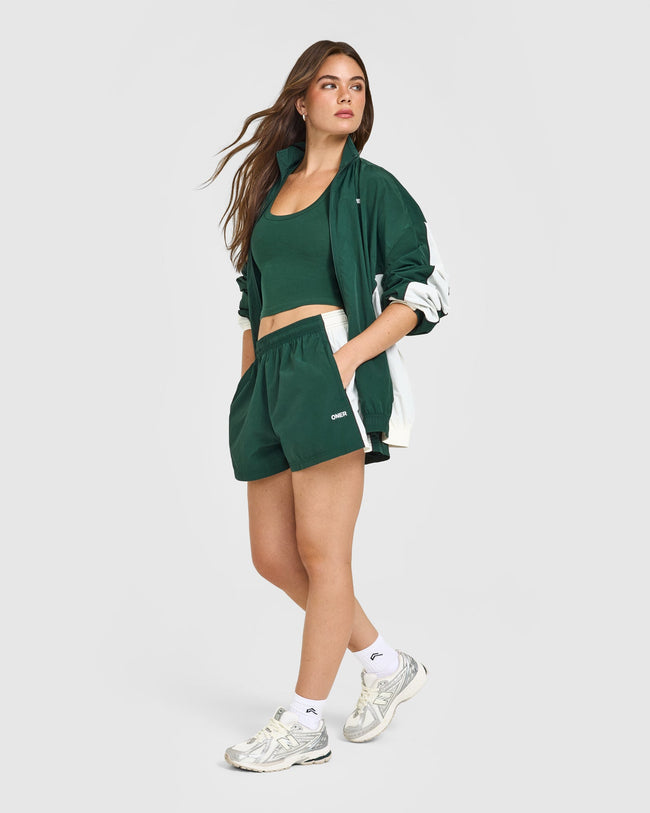 LIFESTYLE_BAU_OVERSIZED_PIPED_WOVEN_TRACK_SHORTS_RACINGGREEN_250806_PDP_1440x1800_03_650x.jpg