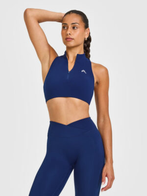 EASYLIFT ZIP HIGH NECK SPORTS BRA WITH WHITE LOGO