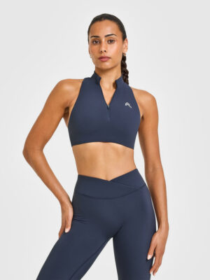 EASYLIFT ZIP HIGH NECK SPORTS BRA WITH WHITE LOGO