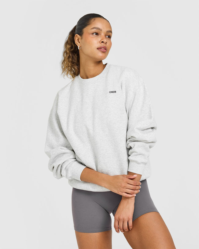 NOOS_FOUNDATIONS_OVERSIZED_SWEATSHIRT_LIGHTGREYMARL_250813_PDP_1440x1800_01_48e85624-efd8-483f-804b-97ad0ee7b7d3_650x.jpg