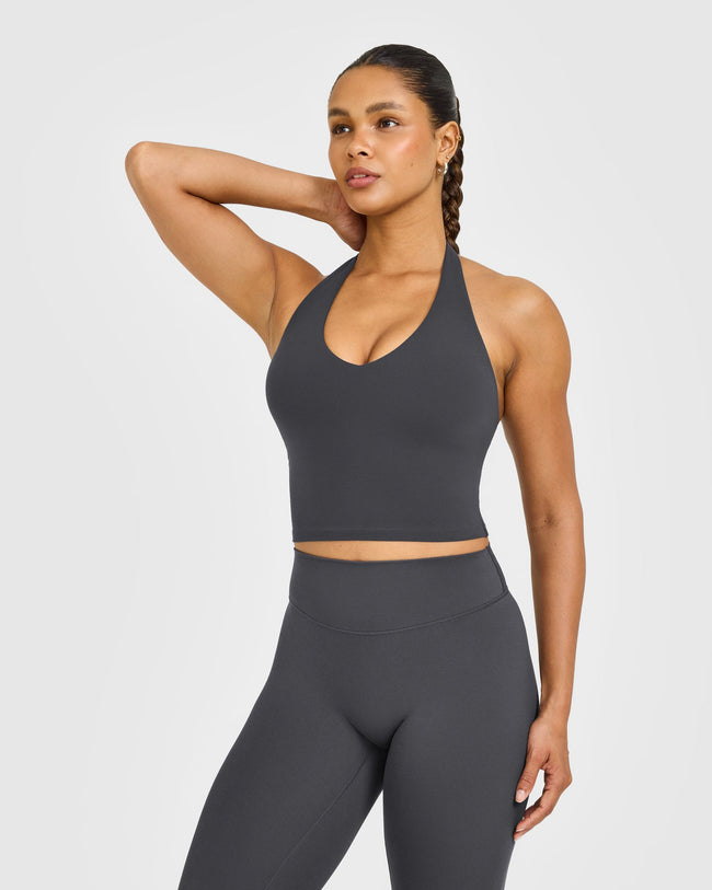 NOOS_SOFTMOTION_HALTER_NECK_MID_VEST_COAL_250919_PDP_1440x1800_01_650x.jpg