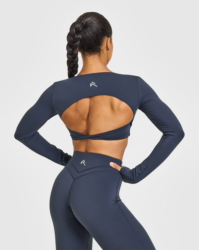 NOOS_UNIFIED_TWIST_FRONT_LONG_SLEEVE_CROP_TOP_TRUEBLUE_250729_PDP_1440x1800_02_650x.jpg