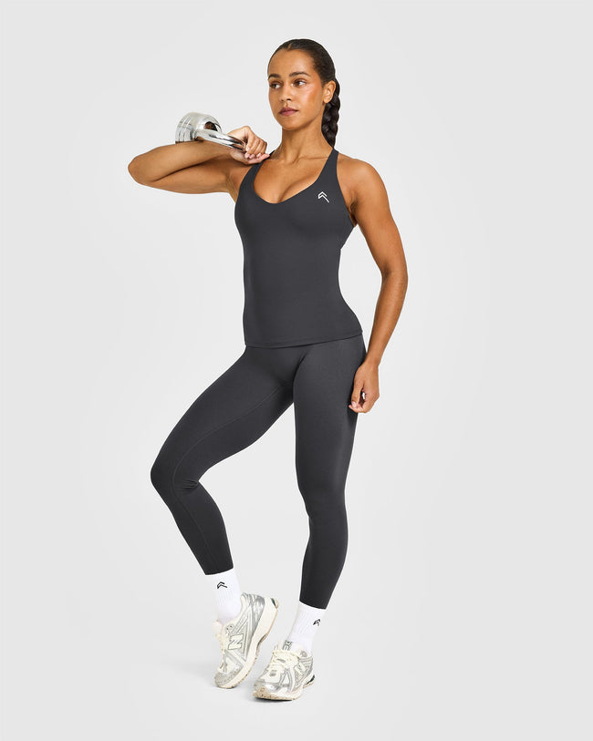 NOOS_UNIFIED_V-NECK_CROSS_BACK_VEST_WHITE_LOGO_COAL_250729_PDP_1440x1800_03_650x.jpg