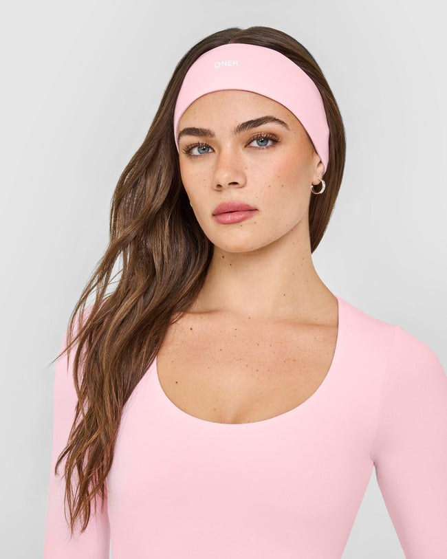 OAXMIA_SOFTMOTION_HEADBAND_CHERRYBLOSSOMPINK_251001_PDP_1440x1800_01_650x.jpg